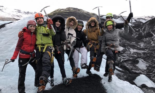 Group of people on a glacier hike tour on the solheimajokull glacier