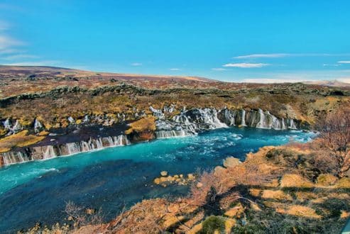 Hraunfossar waterfall with turquoise glacial water from Langjökull forming the Hvítá river